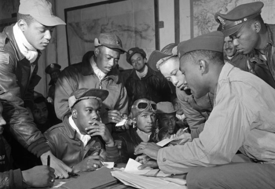 Several Tuskegee Airmen at Ramitelli, Italy, March 1945. Photo by Toni Frissell, Library of Congress. 